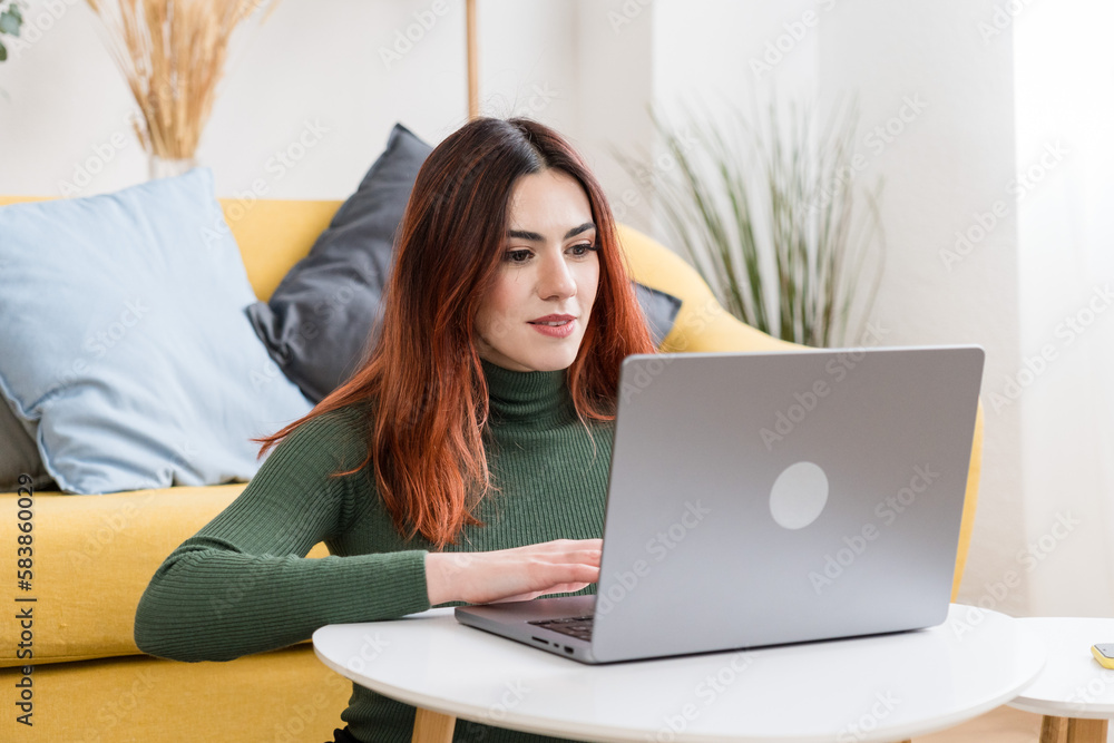 Young woman working on laptop Young woman working on laptop