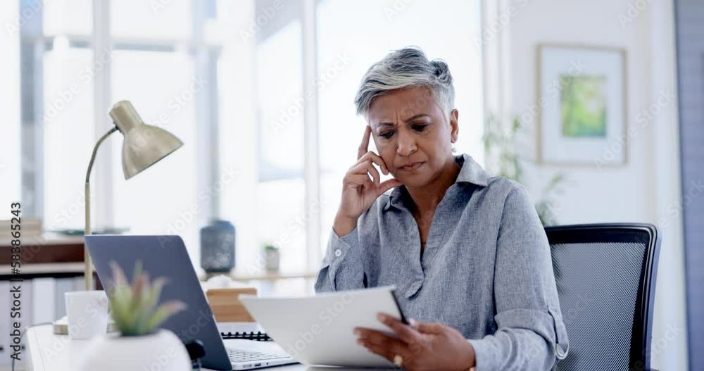 Business black woman thinking of debt review, financial report or budget paperwork with stress and worry in office. Serious boss or confused female manager reading documents of her company finance