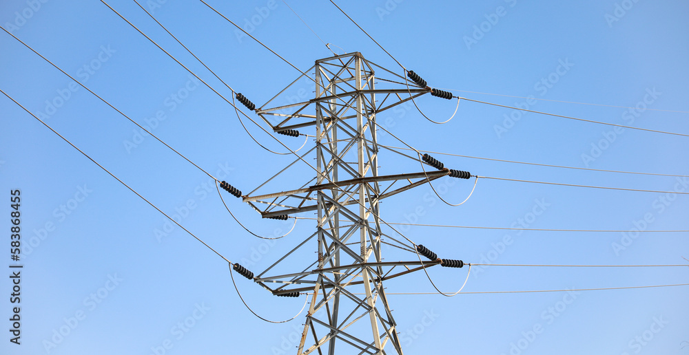 electrical power cable in landscape showing renewable green alternative energy showing steel generator infrastructure also depicting technological industry for electricity distribution at construction electrical power cable in landscape showing renewable green alternative energy showing steel generator infrastructure also depicting technological industry for electricity distribution at construction