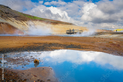 Tourists visiting geothermal area and hot springs at Seltun Hot Springs, Krysuvik, The Capital Region, Iceland, Polar Regions photo