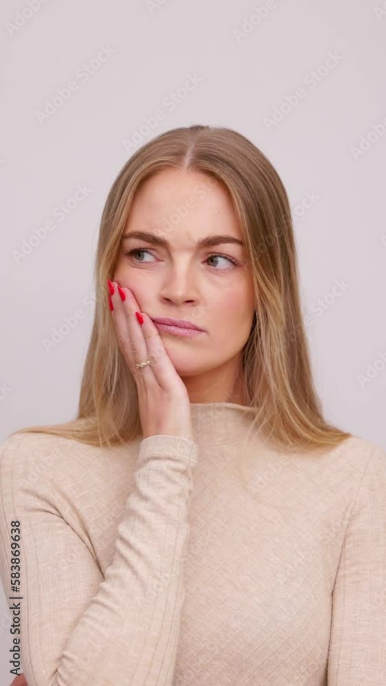 Thoughtful concerned caucasian woman thinking solving problem