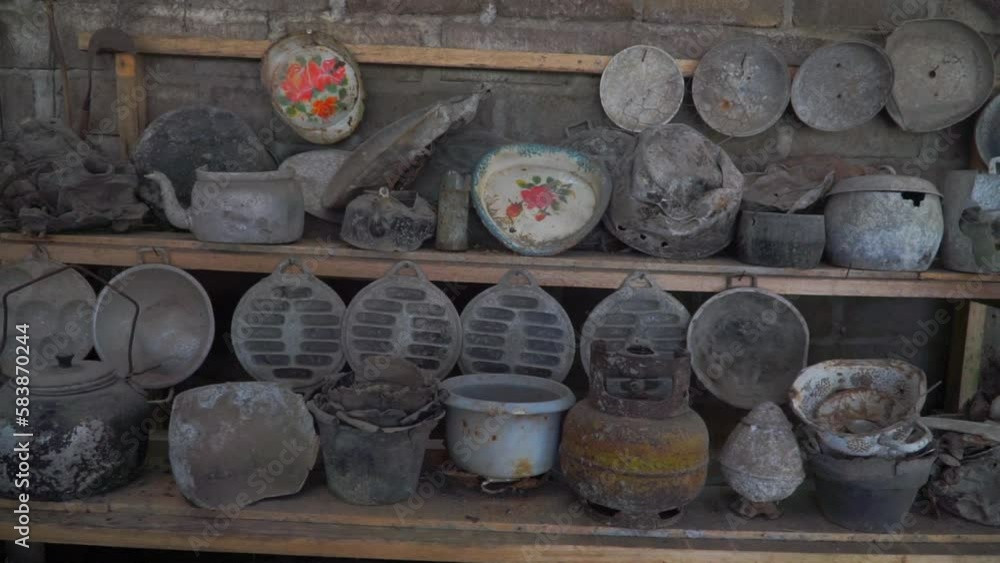 Household items destroyed due to a volcanic eruption disaster. Items looks damaged and melted due to exposure the hot clouds - The eruption of Mount Merapi Volcano Disaster Household items destroyed due to a volcanic eruption disaster. Items looks damaged and melted due to exposure the hot clouds - The eruption of Mount Merapi Volcano Disaster