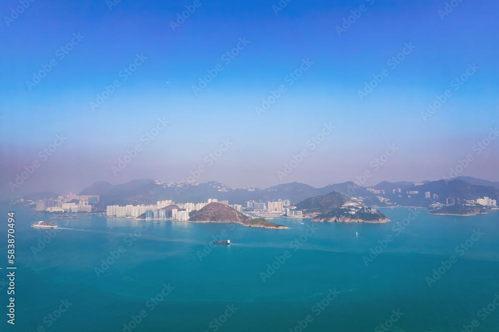 Cargo container ship sailing across the ocean, south of the Hong Kong area Cargo container ship sailing across the ocean, south of the Hong Kong area