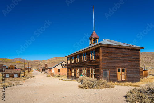 Abandoned wooden deserted buildings in Bodie ghost town, Mono County, Sierra Nevada, Eastern California, California photo