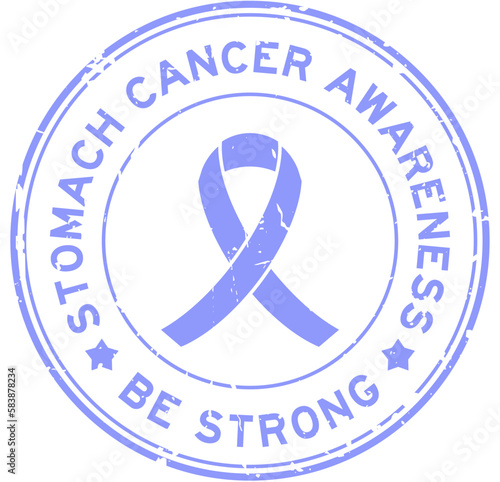 Grunge lavender blue color stomach cancer awareness be strong word with ribbon banner as round seal stamp on white background
