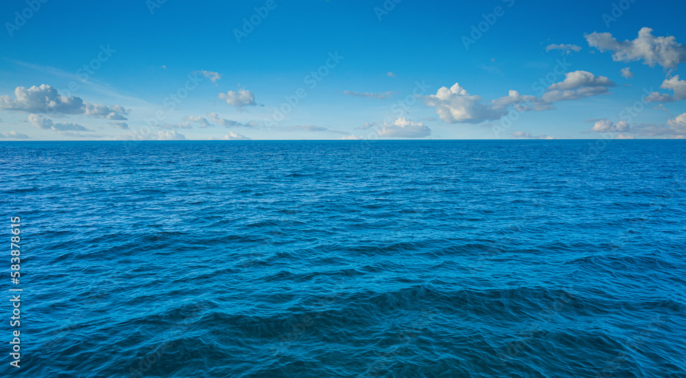 Obraz premium sea and sky,Calm sea and blue sky background.