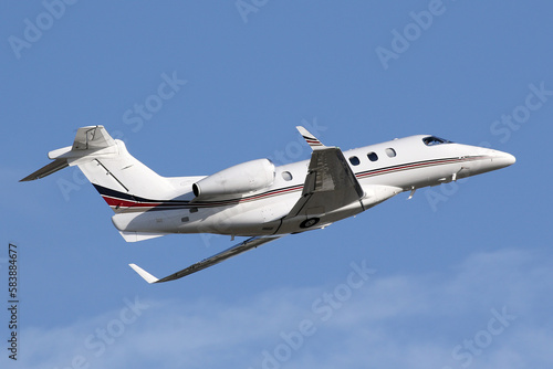 Phenom 300 Private Jet - Taking off from Atlanta Peachtree DeKalb Airport photo