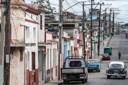 A jungle of telephone lines in a street behind the docks, Regla, Havana photo