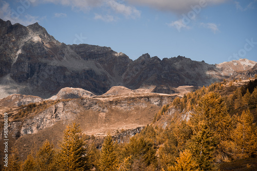 Clouds partially obscure the mountain peaks in the Alpe Devero  Northern Italy  during autumn