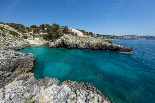 Cala dell Acquaviva beach and rocky cove looking along coast to Castro, Castro, Lecce Province, Puglia photo