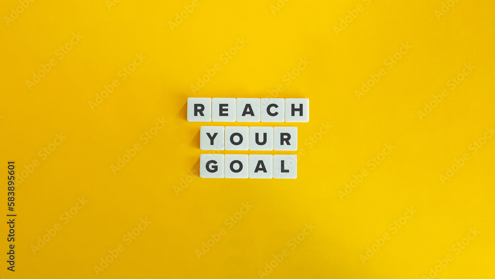 Reach Your Goal Phrase on Letter Tiles on Yellow Background. Minimal Aesthetics. - obrazy, fototapety, plakaty 
