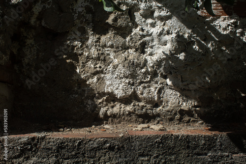 empty space with a wall full of shadows