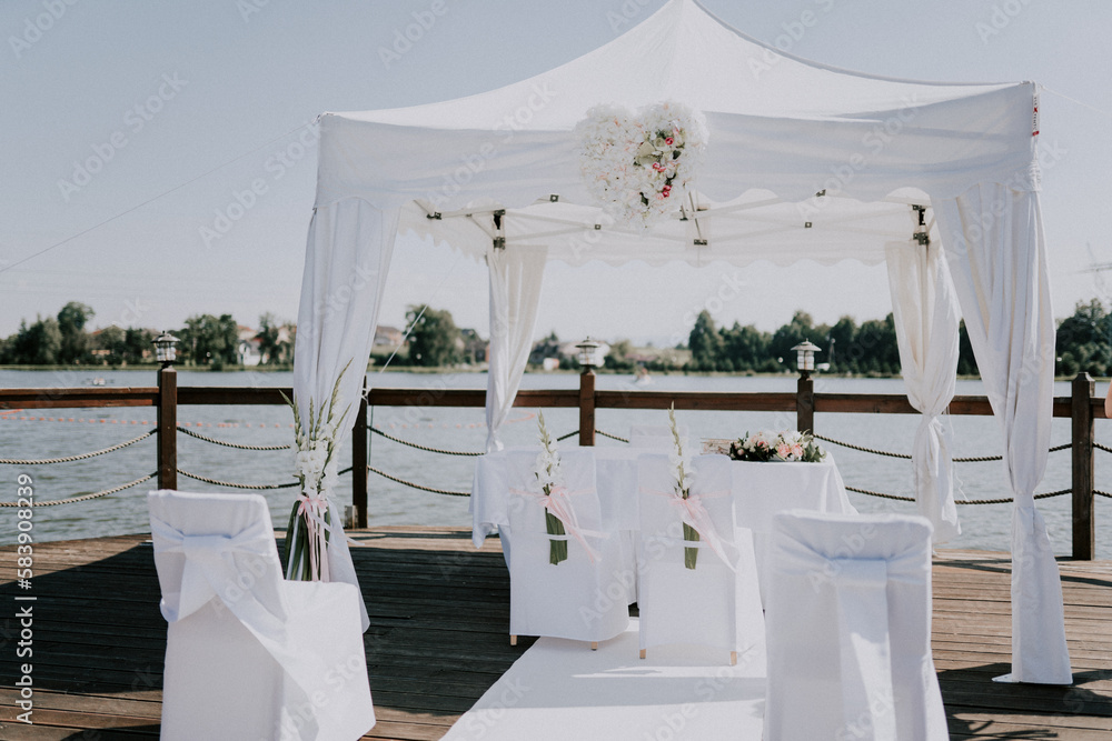 white decoration on the marina, outdoor wedding decoration 