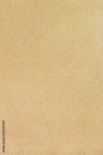 Yellowed recycled paper texture laid in vertical format