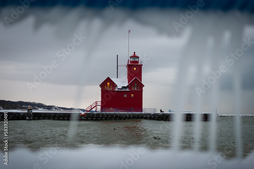 lighthouse through icicles