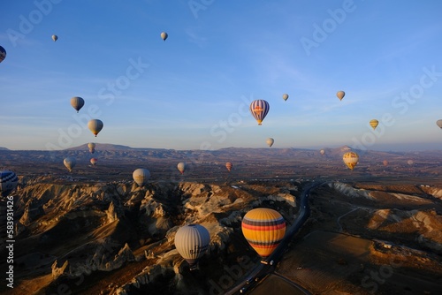 Drone shot of hot air balloons in Cappadocia, Turkey
