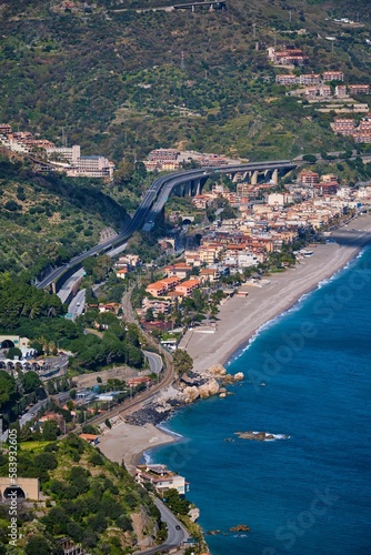 Beautiful view of a nice and splendid coast and the small town at the coast in Sicilia