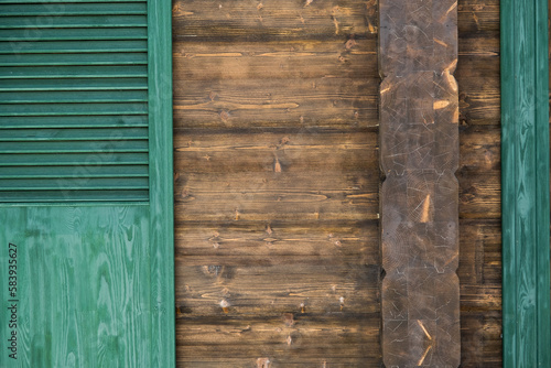 Wallpaper Mural Green wooden shutters as a detail of the wooden house Torontodigital.ca