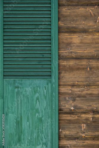 Wallpaper Mural Green wooden shutters as a detail of the wooden house Torontodigital.ca