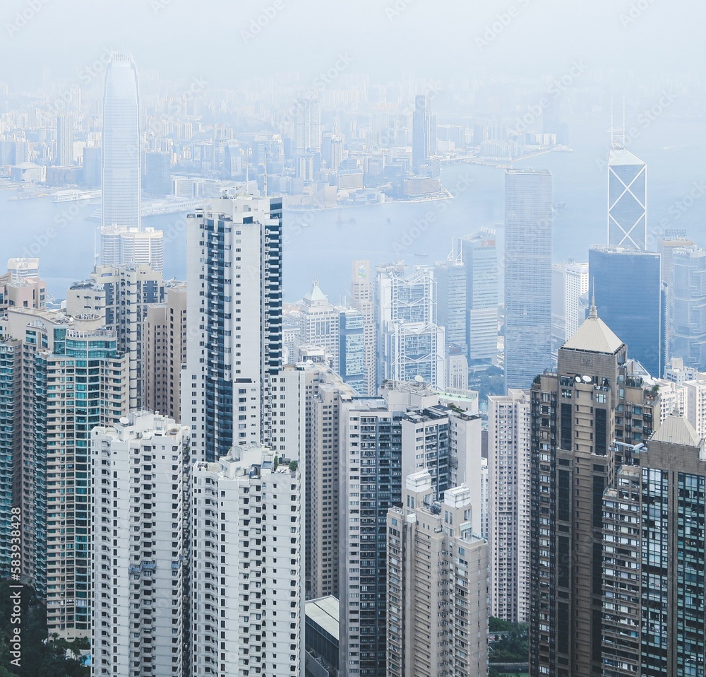 Aerial view of skyscrapers and high-rise buildings in Kowloon from the peak