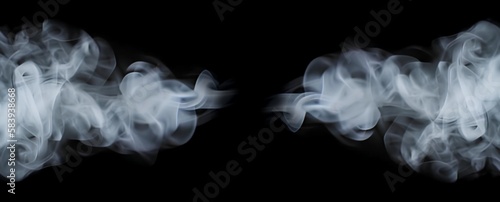 White smoke clouds from two sides on black background. 