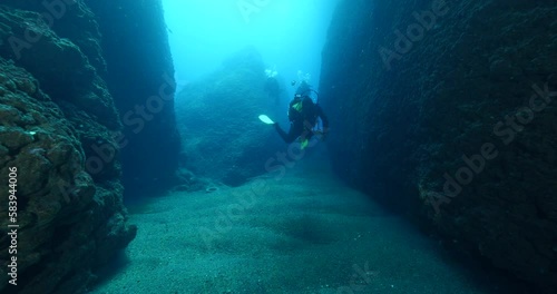 Wallpaper Mural cave diving underwater scuba divers exploring caves and having fun ocean scenery Torontodigital.ca