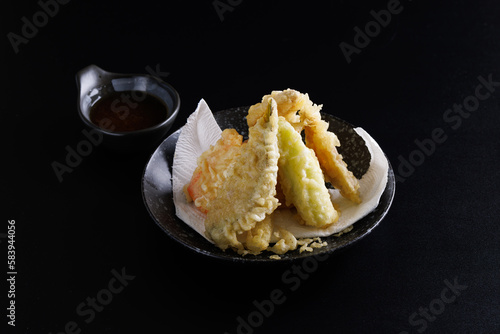 Mix tempura with shrimp fish and vegetable Japanese food isolated in black background