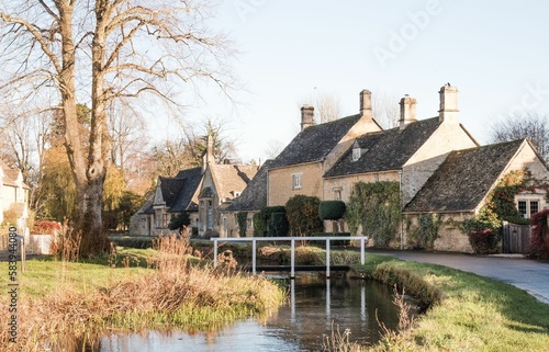 Beautiful shot of the Lower Slaughter buildings in the Cotswolds, England © Pez Photography/Wirestock Creators