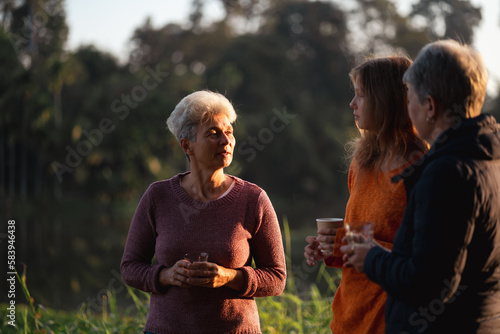 family of senior woman and ...