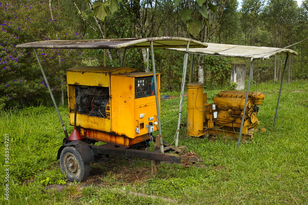 Power generator and a diesel engine at the lower station of Teleferico in Minjoy Park in Mindo, Ecuador, South America
