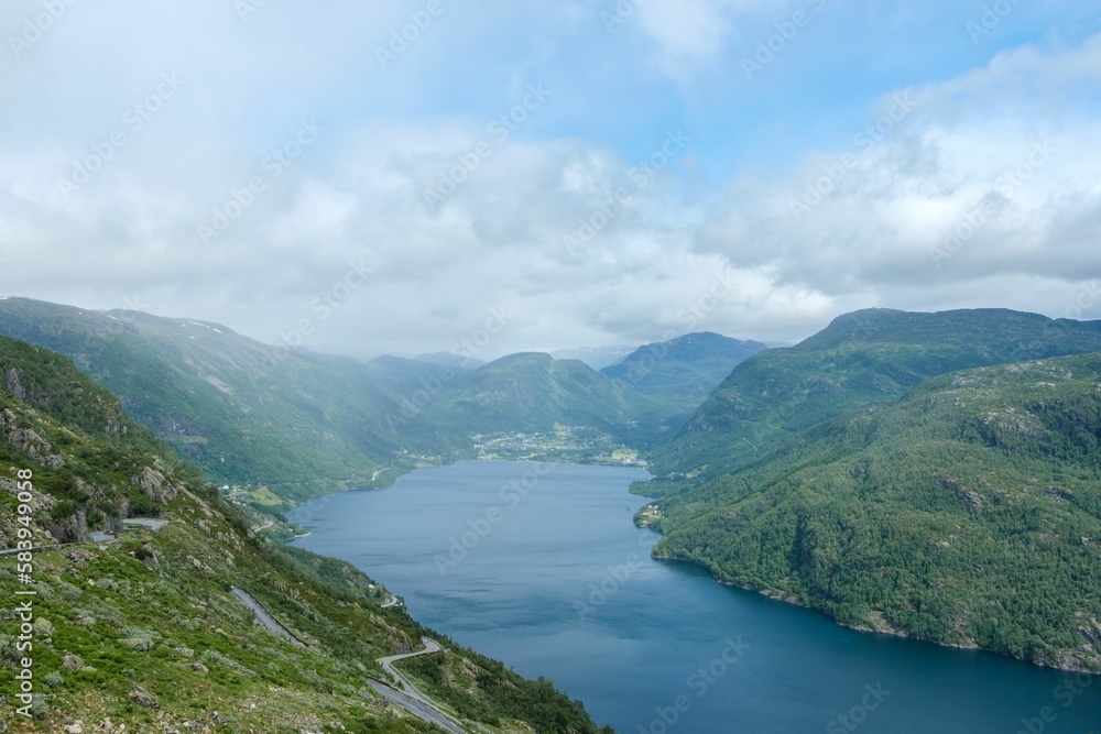 Aerial view of the beautiful fjord near green mountains in Roldal, Norway Aerial view of the beautiful fjord near green mountains in Roldal, Norway