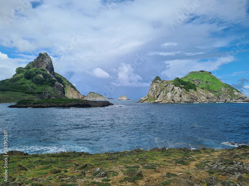 Beautiful view of secondary islands in Fernando de Noronha on a cloudy summer day. .