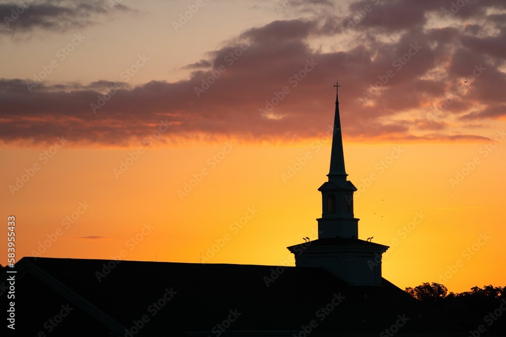Silhouette shot of an old church during sunset