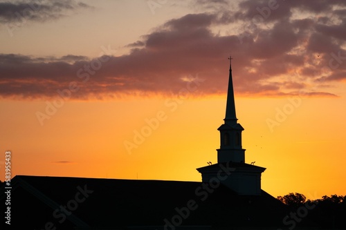 Bilde på lerret Silhouette shot of an old church during sunset