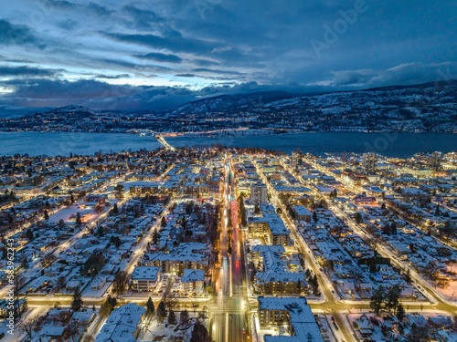 Drone shot of buildings in Kelowna, British Columbia, Canada in the evening