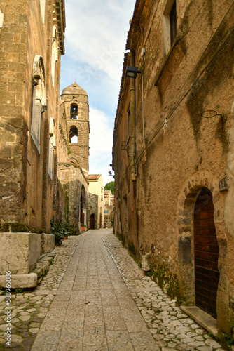 Fototapeta Naklejka Na Ścianę i Meble -  Narrow street among the old stone houses of the oldest district of the city of Caserta