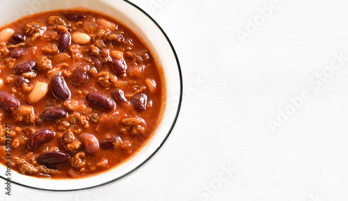 Baked beans with ground beef, jalapeno pepper and bacon