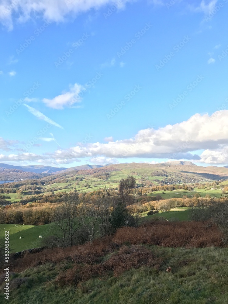 Mountain View with rugged countryside and  a dramatic blue sky background. Cumbria England. 