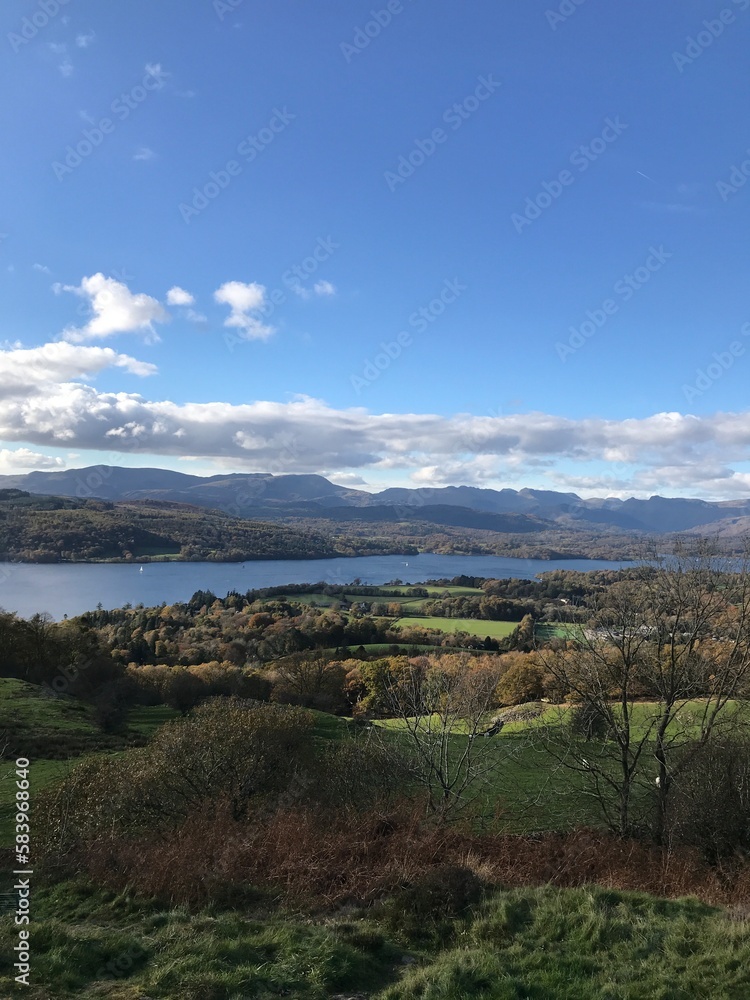 Mountain View with rugged countryside and  a dramatic blue sky background. Cumbria England. 