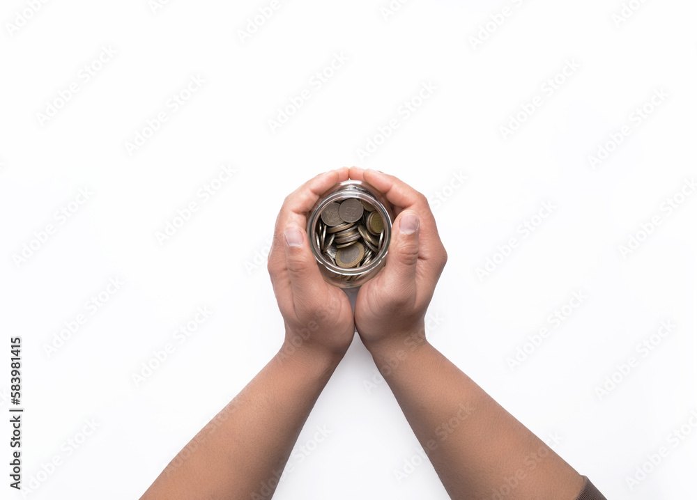 Man holding glass piggy bank in money saving concept white background Man holding glass piggy bank in money saving concept white background