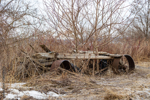 Аntique ruined cart on the side of the road