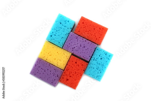 Background of multi-colored bright sponges for washing dishes.