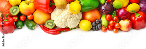 Set of vegetables and fruits isolated on white . Wide photo. Free space for text.