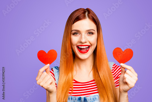 People person fun joy funny facial expression concept. Close up phoyo portrait of charming glad gorgeous nice cute lovely lady showing holding small little hearts in hands isolated background photo