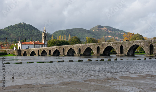 Wallpaper Mural ancient roman bridge over the river in ponte de lima portugal Torontodigital.ca