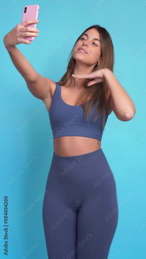Smiling woman taking selfie. Vertical video. Smiling woman taking selfie. Vertical video.