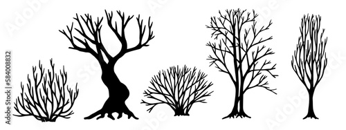 Set of silhouettes of bare trees, bushes.Vector graphics.	