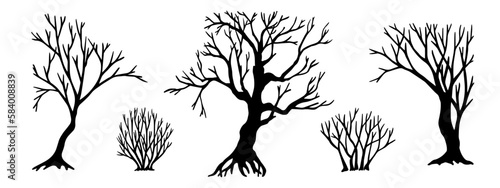 Set of silhouettes of bare trees, bushes.Vector graphics.	