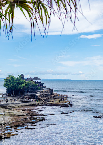beach and rocks and temple in bali,indonesia