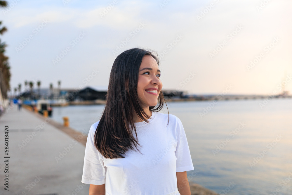 young girl smiling and looking the horizon young girl smiling and looking the horizon